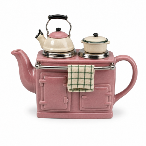 Range Cooker Teapot in dusty pink: a ceramic cast-iron range with a matching kettle lid, a green checked tea towel and a cream pot on the hob