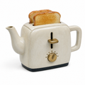Toaster Teapot in cream: a ceramic two-slot toaster with two slices of toast forming the lid and a brass lever and dial